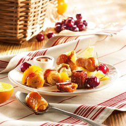 Mini canelés pochés dans un sirop d'armagnac